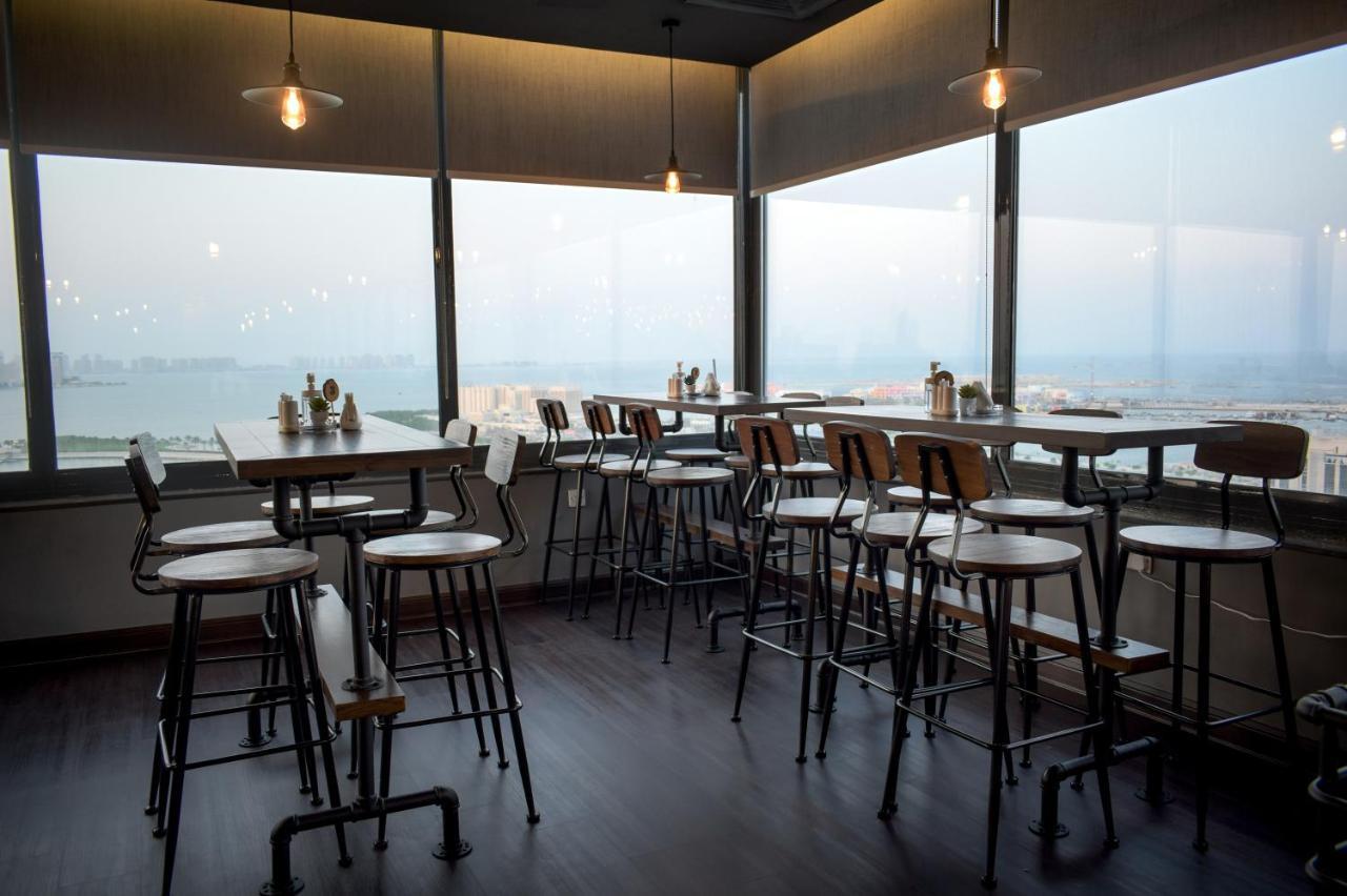 Saraya Corniche Hotel Ντόχα Εξωτερικό φωτογραφία The interior of the restaurant