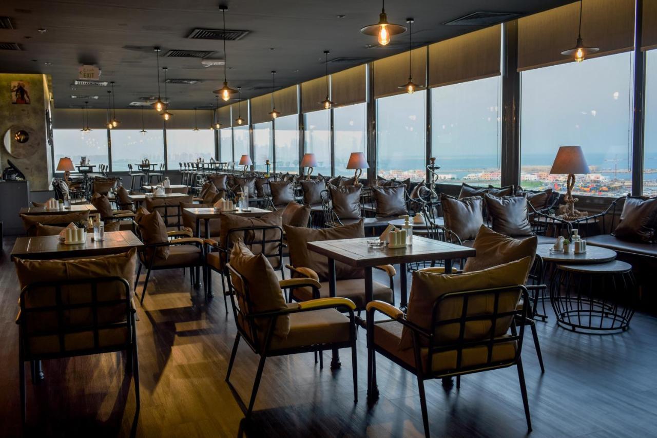 Saraya Corniche Hotel Ντόχα Εξωτερικό φωτογραφία The interior of the restaurant