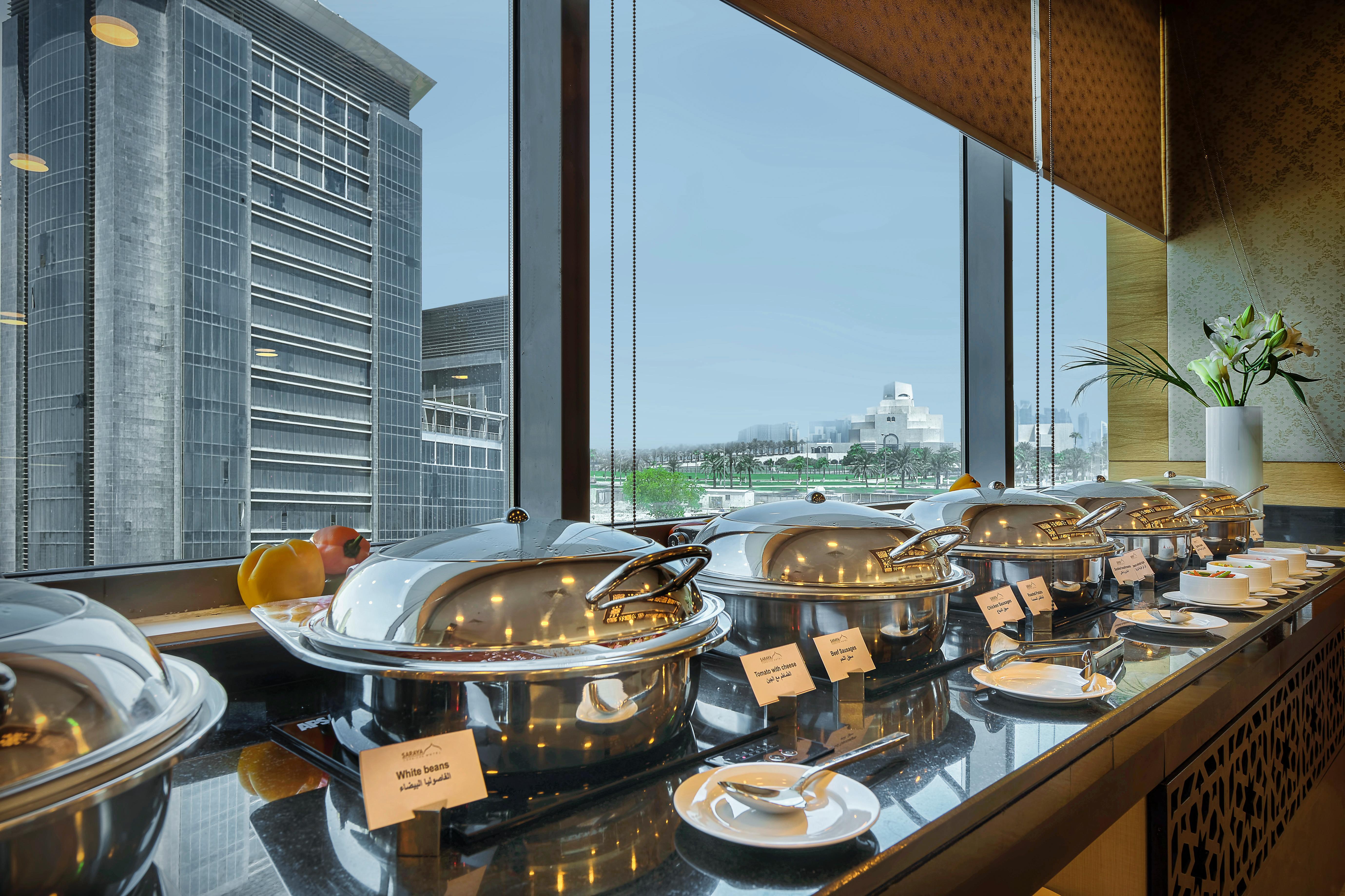 Saraya Corniche Hotel Ντόχα Εξωτερικό φωτογραφία A buffet at a hotel